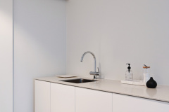 Avara ja minimalistinen kodinhoitohuone