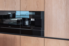 Vetimettömät kodinkoneet sulautuvat kalusteseinään