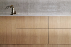 himacs tasolla ja tammiovilla viimeistelty kodinhoitohuone