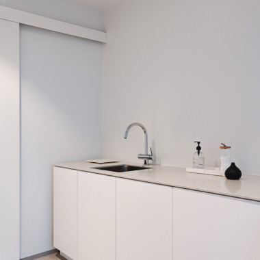 Avara ja minimalistinen kodinhoitohuone